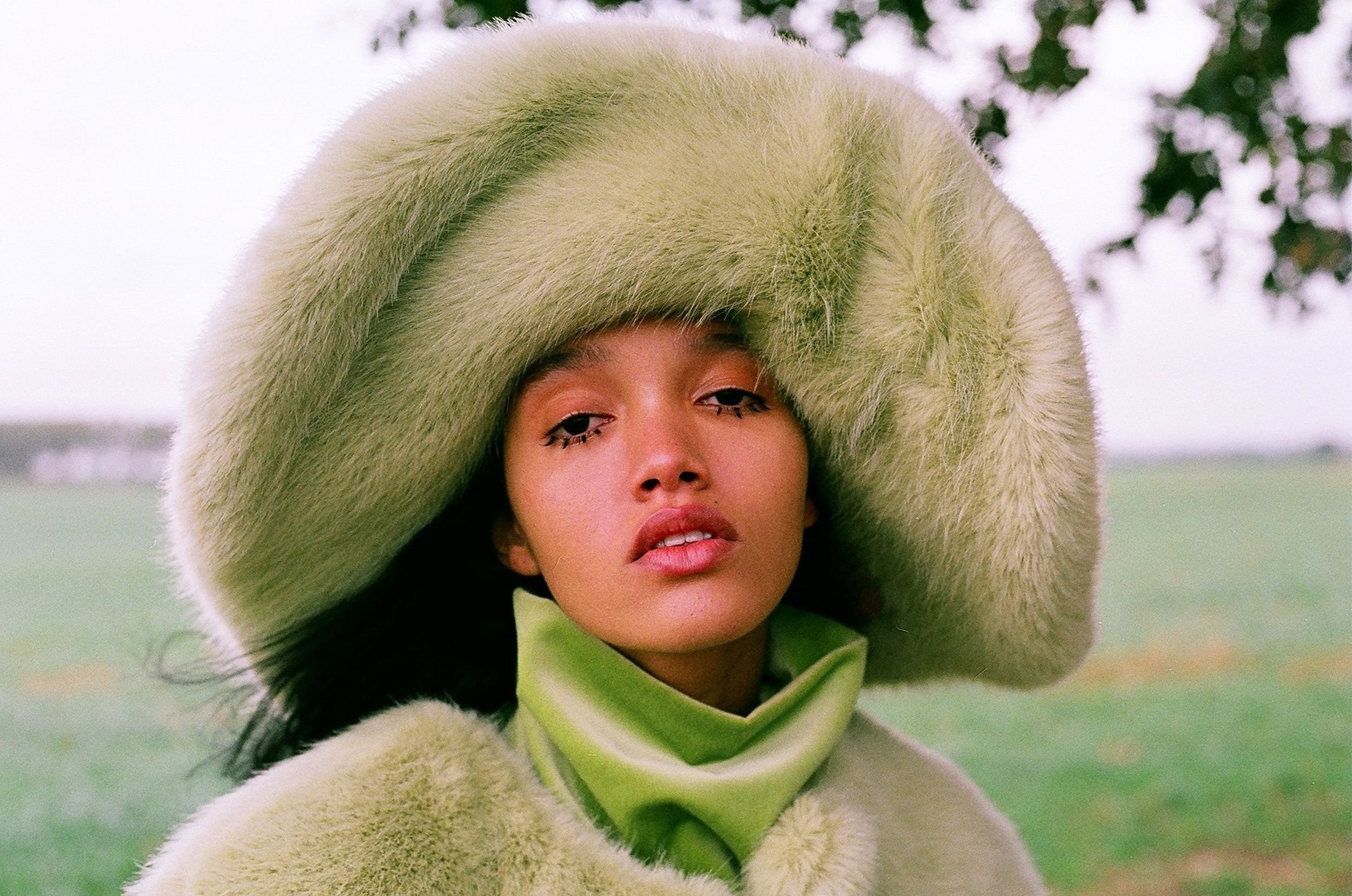 green fur hat