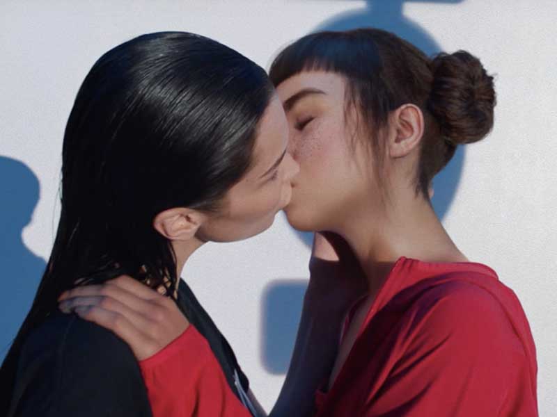 Bella Hadid and Lil Miquela kiss in Calvin Klein’s latest campaign