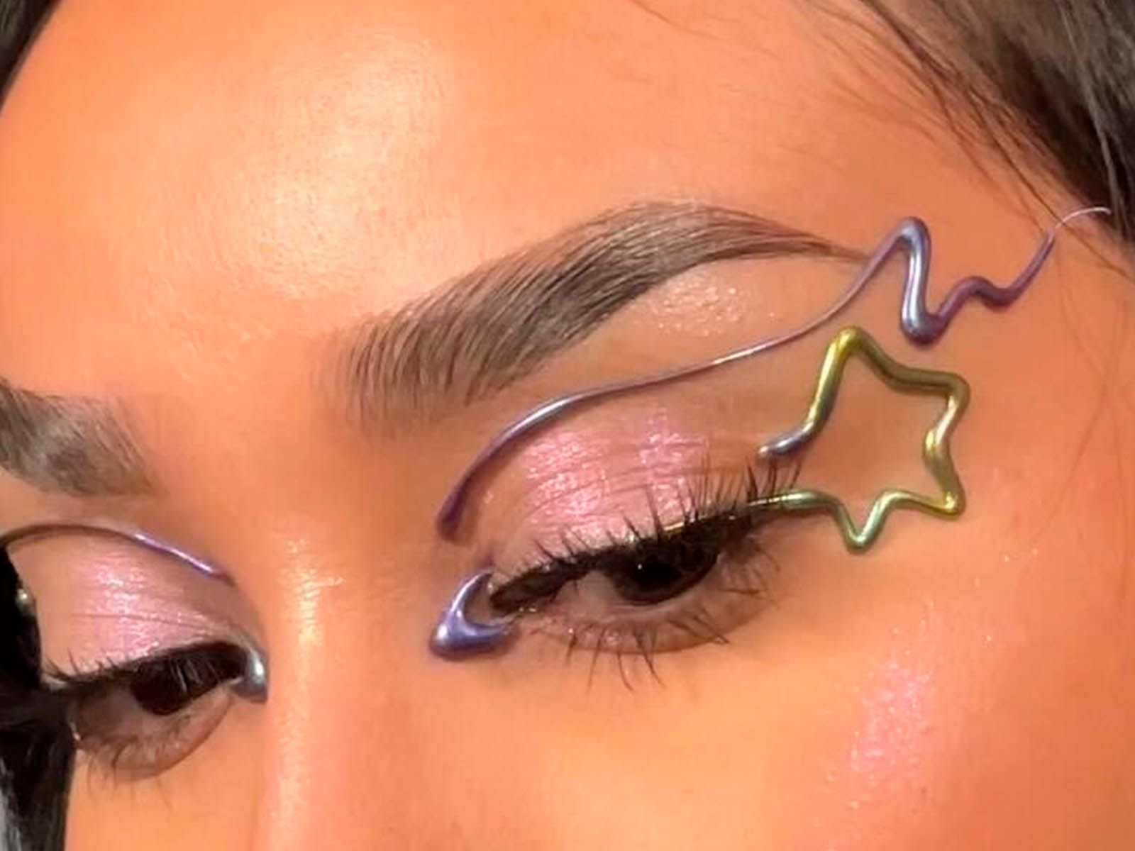 People on TikTok Are Using Hot Glue Guns to Create Graphic Makeup