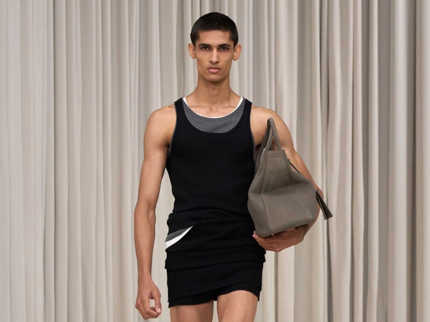 Layer Up: The tank top is no longer worn alone